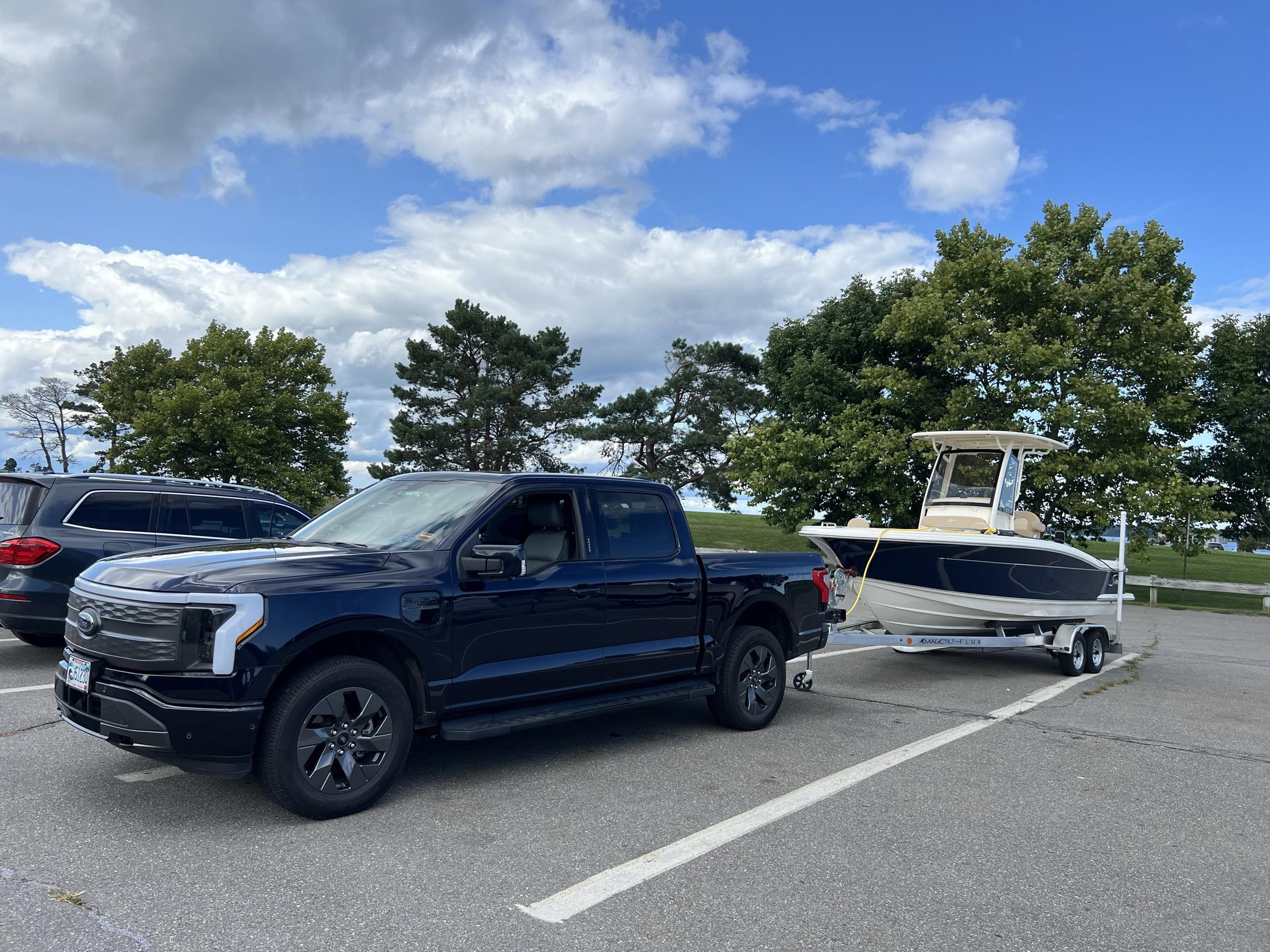 All-Electric Truck Tows & Charges an All-Electric Boat